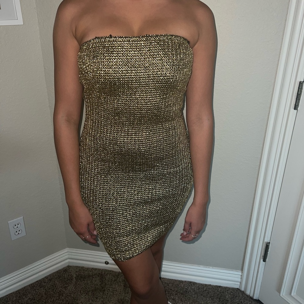 Gold body on cocktail dress.